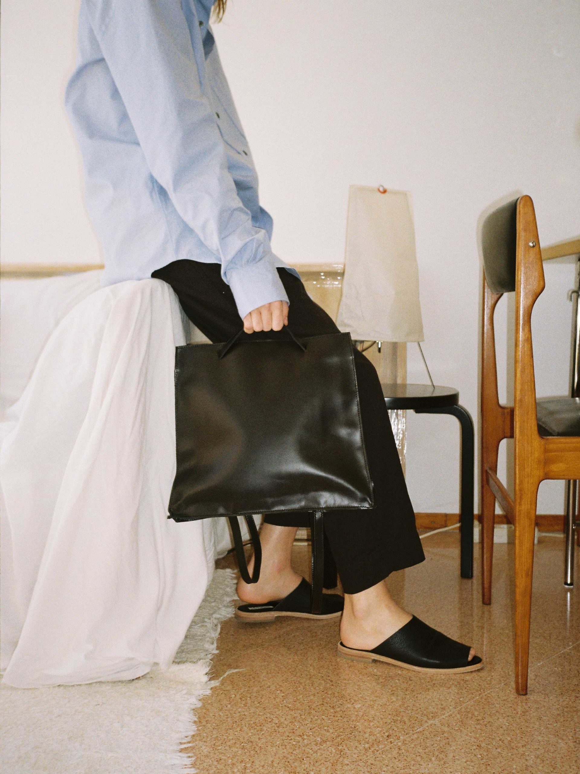 Black leather bagpack