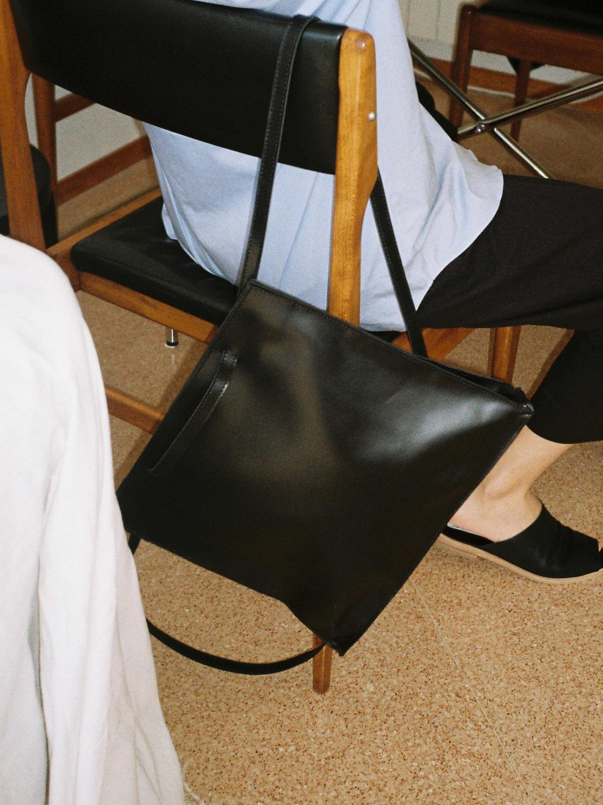Black leather bagpack
