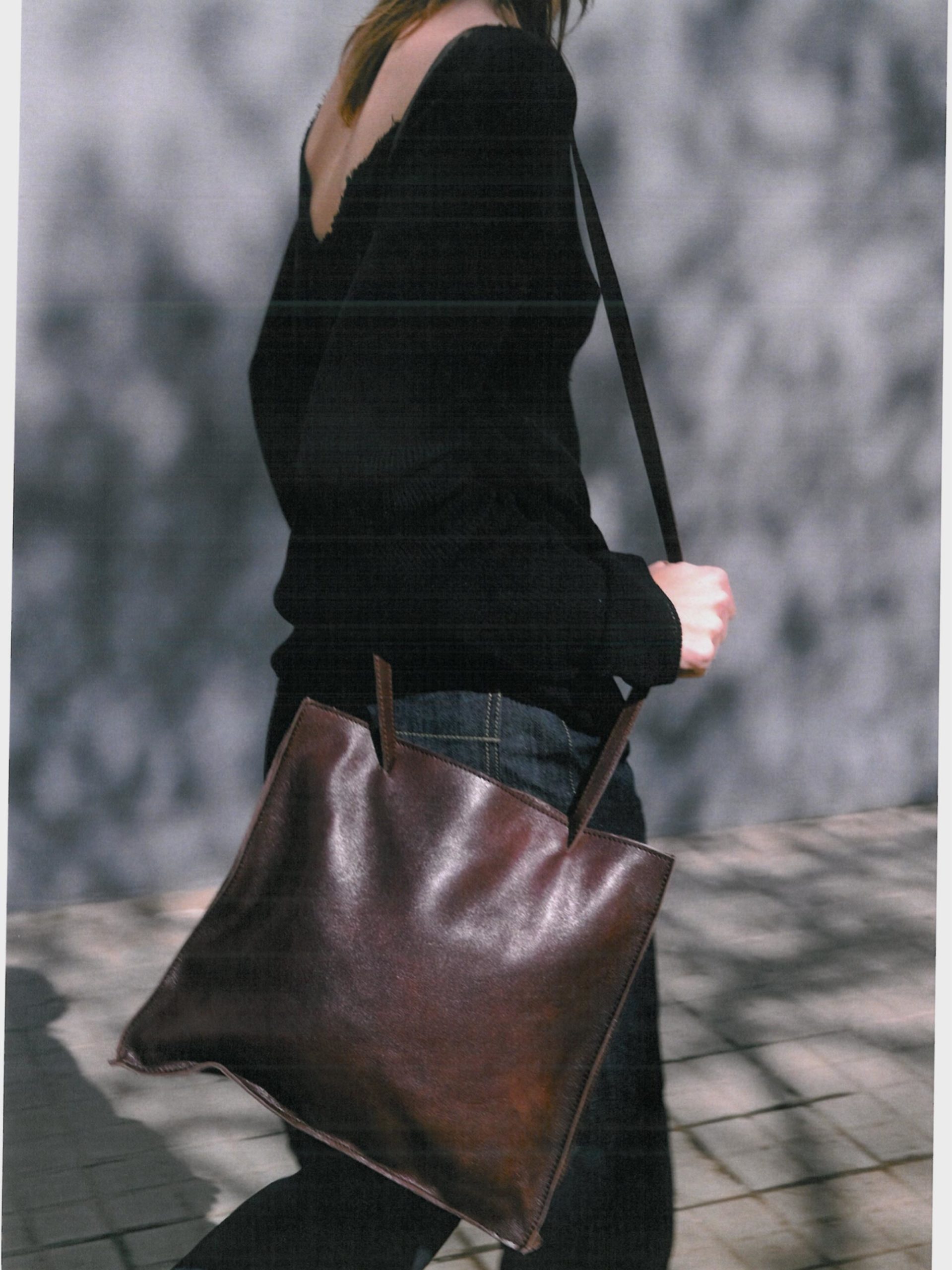 Dark brown leather bagpack