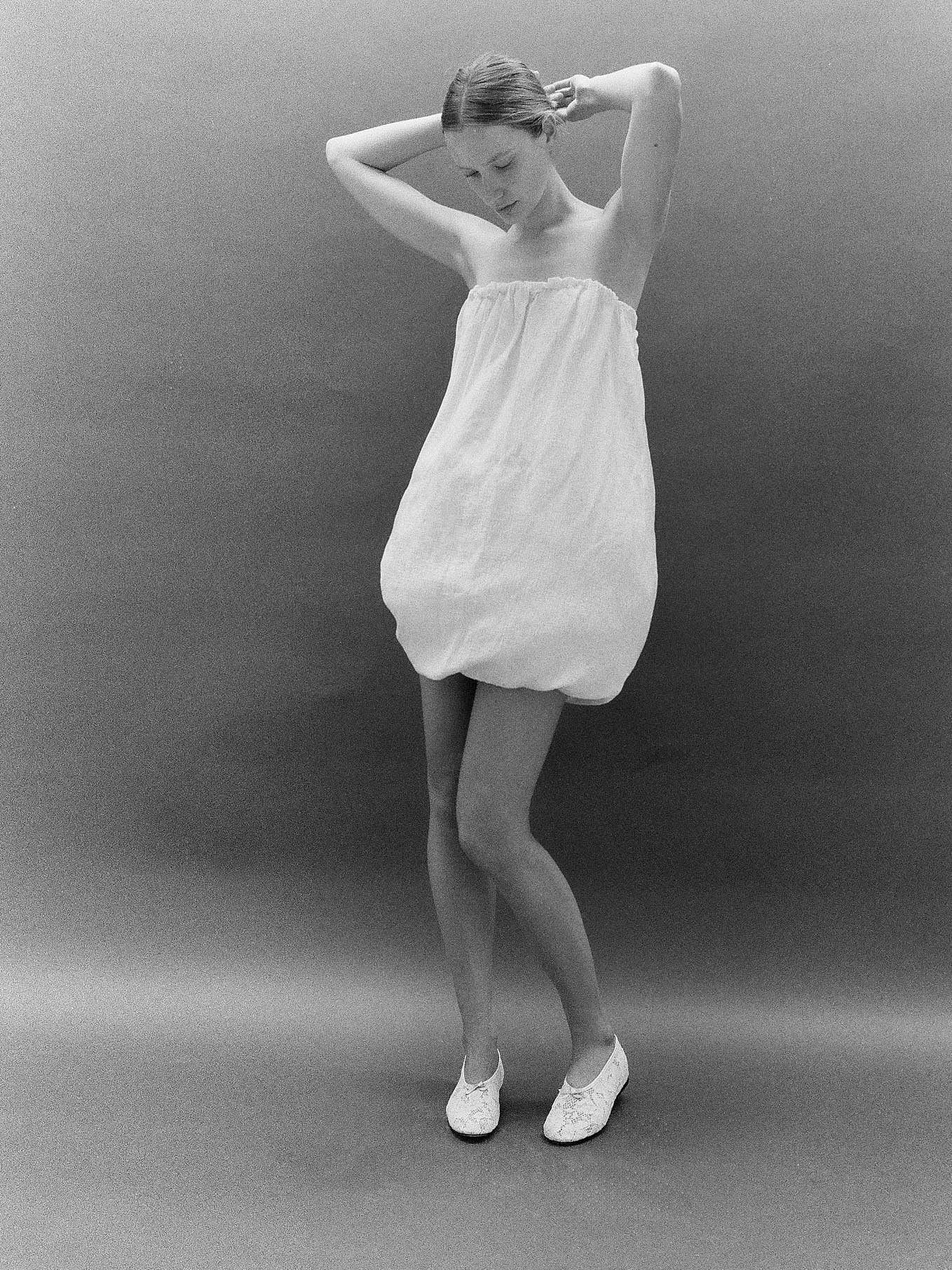 Ballet flats in lace fabric in white
