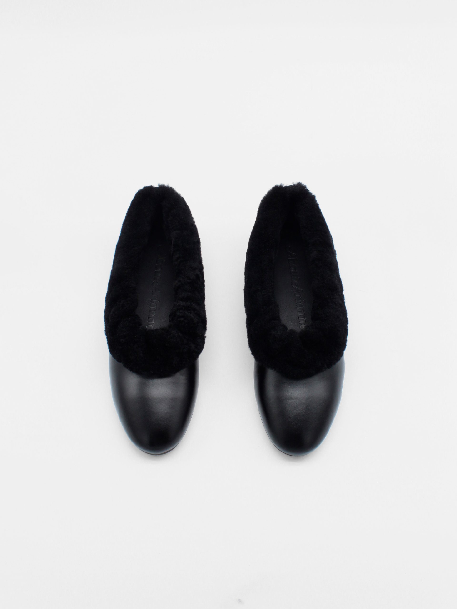 Fur lined ballet flats in black by about arianne