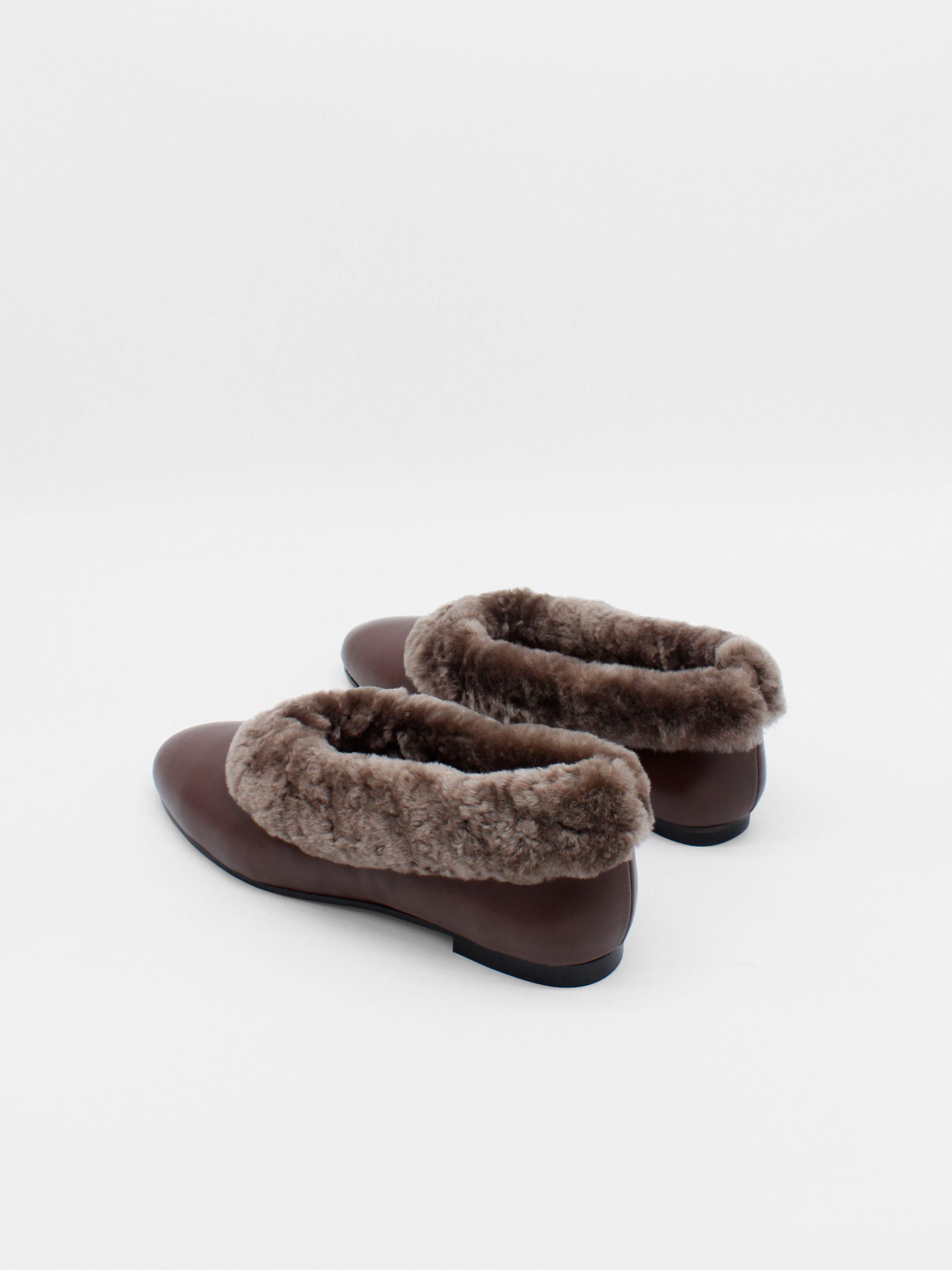 Fur lined ballet flats in brown by about arianne