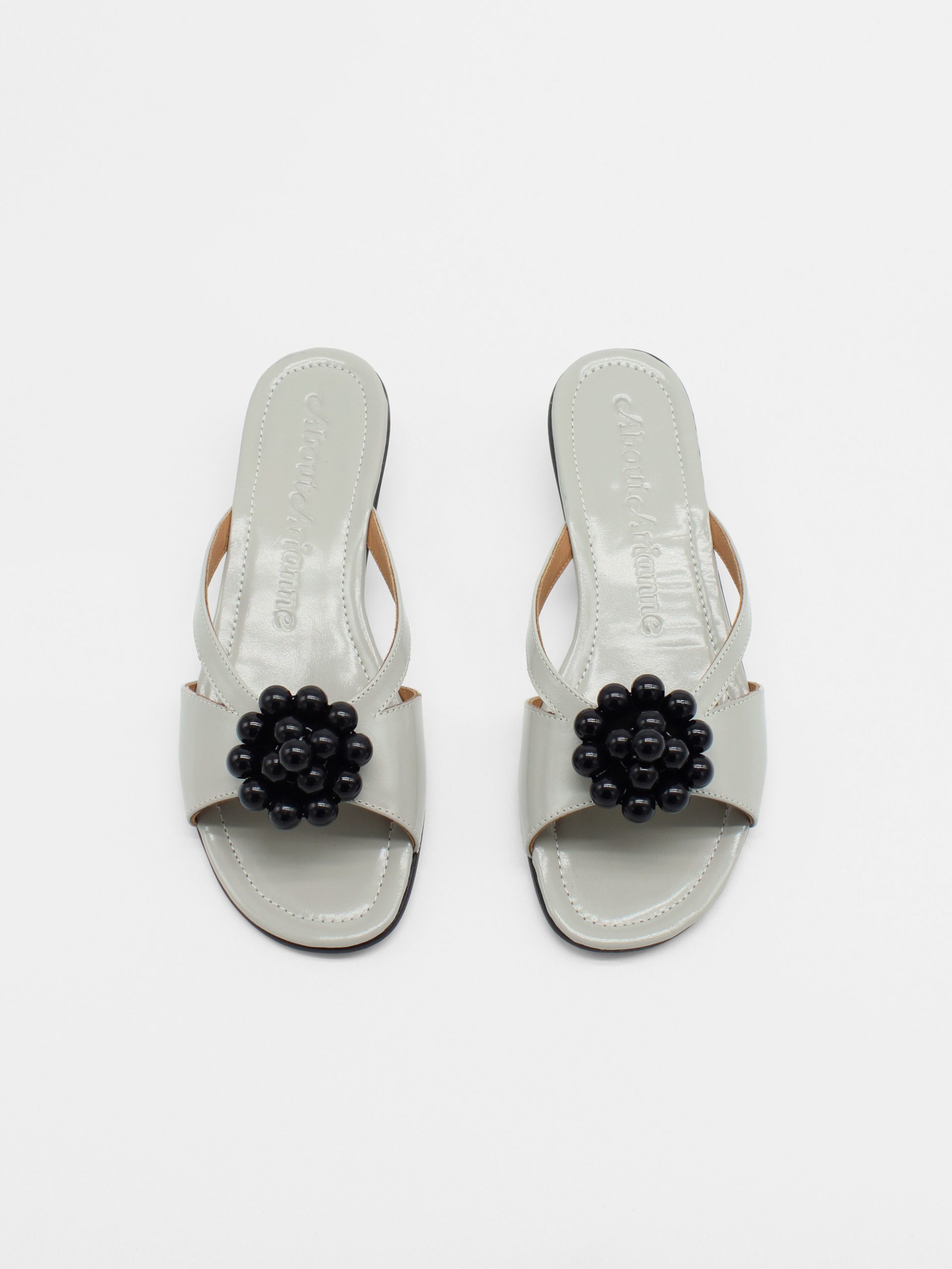 gray kitten heels with beaded ornament by about arianne
